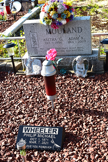 Adam K & Asetha G. Mouland